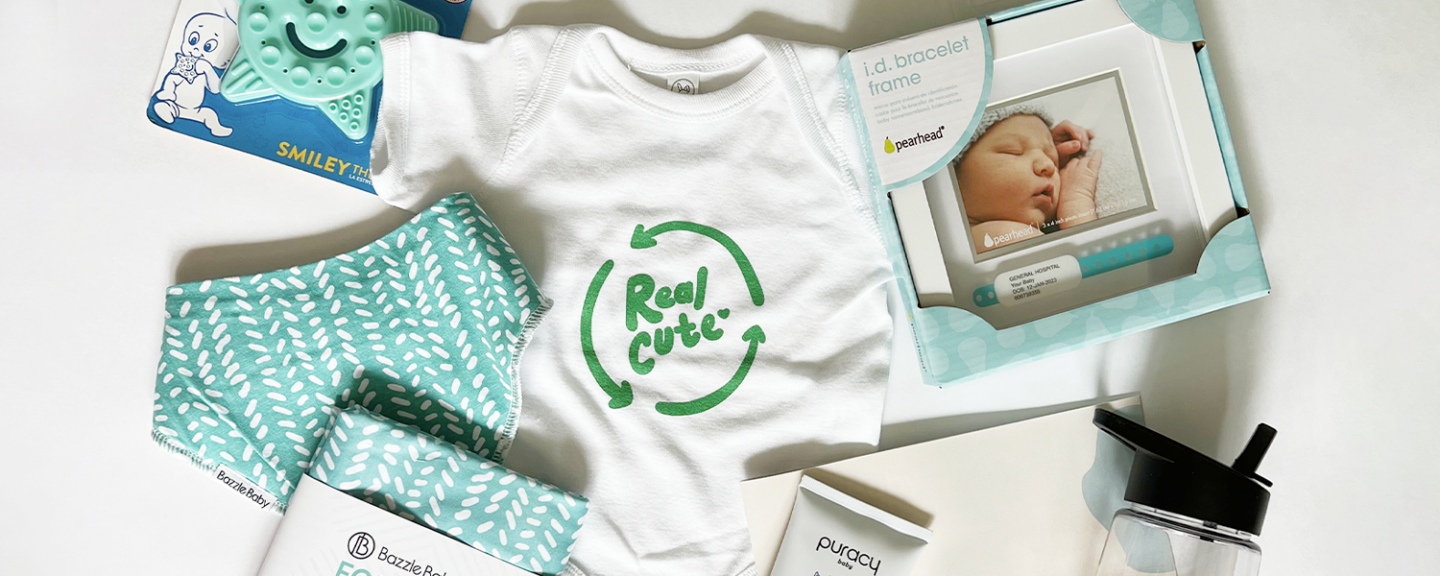 Baby clothes with a onesie that says 